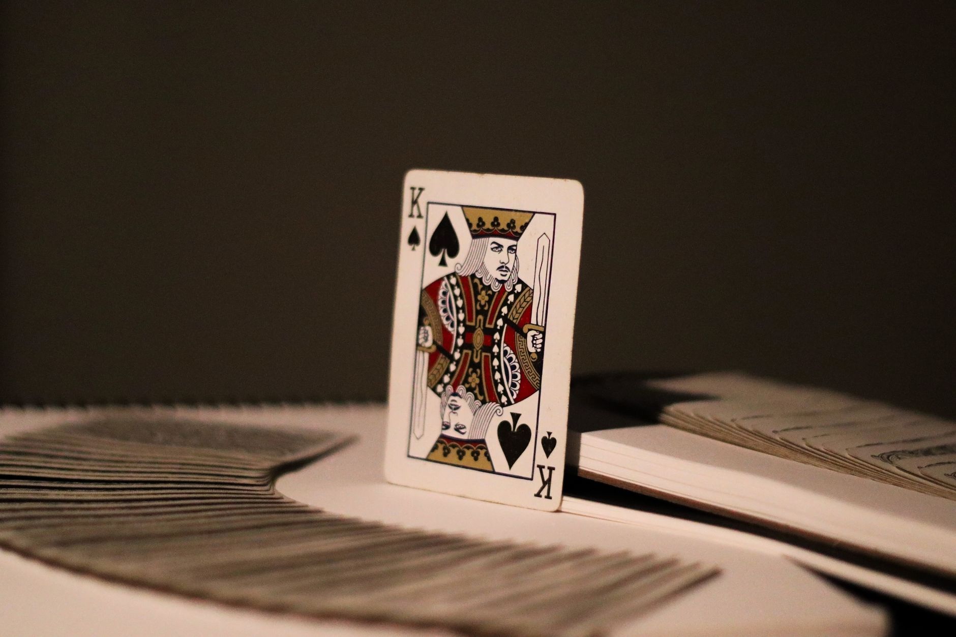Close-up of King of Spades playing card, symbolizing chance and luck in a casino setting.
